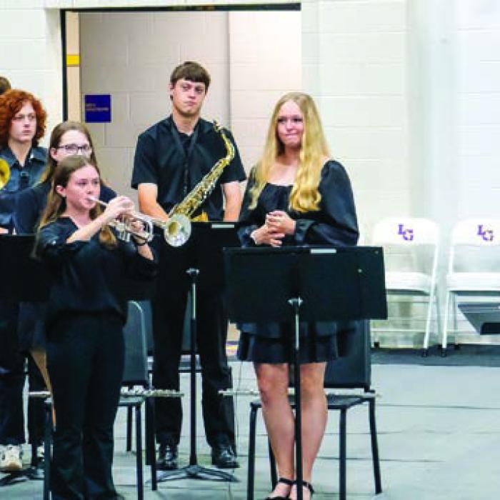 Trumpet players from the Mighty Leopard Band under the direction of Band DIrector Chris Cooper perform “Taps” at the closing of Monday’s Veterans Day program.