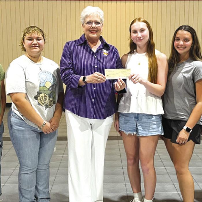 In support of the Court Annunciation No. 1962 Junior Catholic Daughters of the Americas, Regent Sherry Hebert, pictured fourth from the left, presented the annual monetary gift to JCDA members from left, Aby Garza, Adalyn Emmel, Jaylia Lucio, President Ella Nygren, JCDA State Second Vice President Celeine Fabre, Makenna Emmel, and Counselor Peggy Supak.