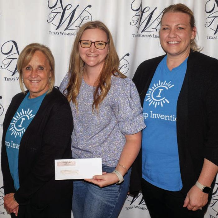 Camp Invention received a $2,000 grant. Accepting the award were Sherry Schmidt (left) and Krista Pietsch (right). Presenter was Kristen Vandever (center).