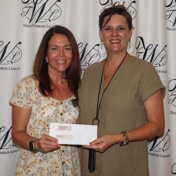 The Family Crisis Center received a $2,500 grant. Accepting the award was Brandi Senters (left). Presenter was Ashley Bishop (right).