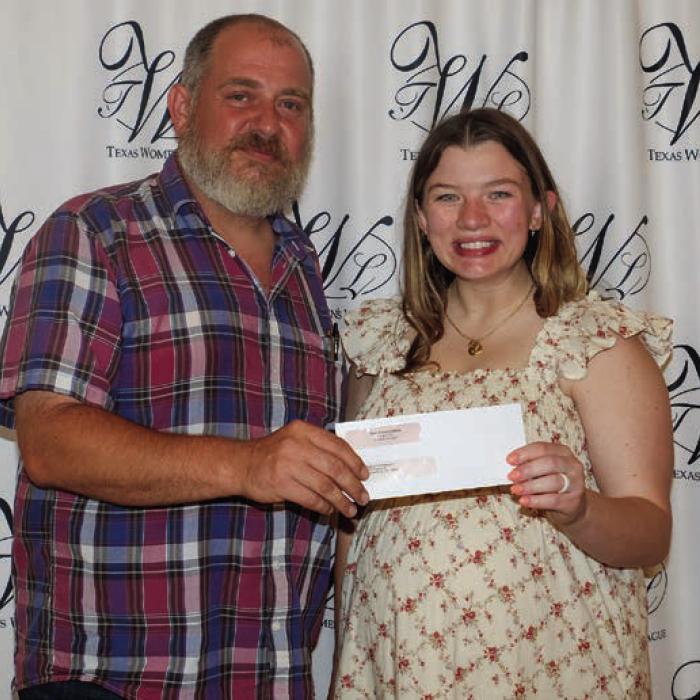 Fayette County Habitat for Humanity received a $3,700 grant. Accepting the award was Kenny Couch (left). Presenter was Kait Geer (right).