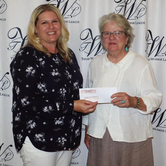 James Dick Foundation for the Performing Arts received a $3,700 grant. Accepting the award was Pat Johnson (right). Presenter was Lyndsey Vasek (left).