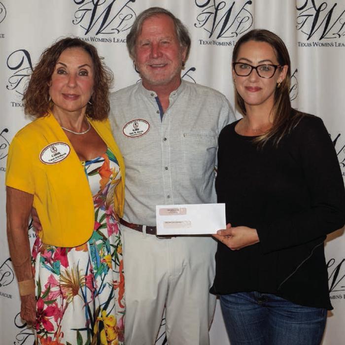 Polka Lovers Club of Texas Museum received a $3,700 grant. Accepting the award were Carol and Gary Bucek (left). Presenter was Susannah Mikulin (right).