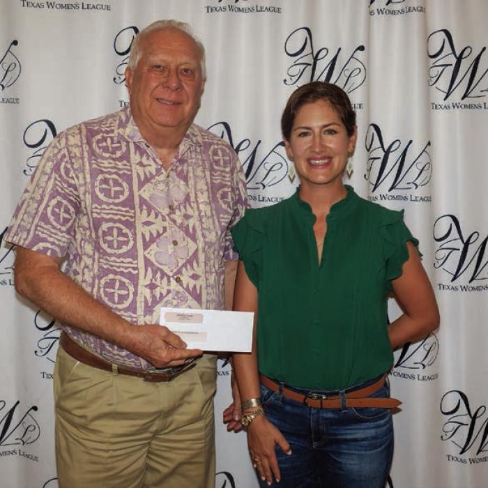 Friends of the La Grange Railroad Depot received a $2,600 grant. Accepting the award was Gary Lincke (left). Presenter was Sophia Massey (right).
