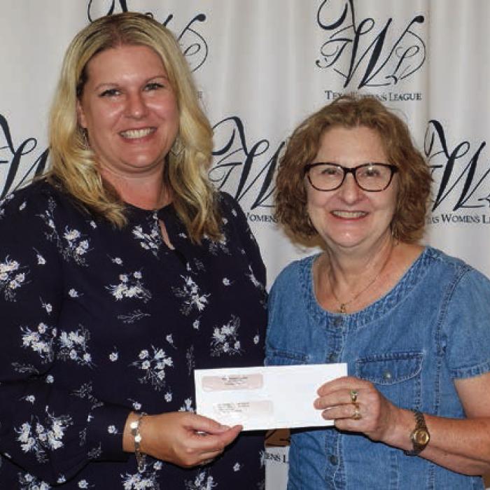 Sacred Heart Catholic Church and School received a $3,700 grant. Accepting the award was Cindy Fletcher (right). Presenter was Lyndsey Vasek (left).