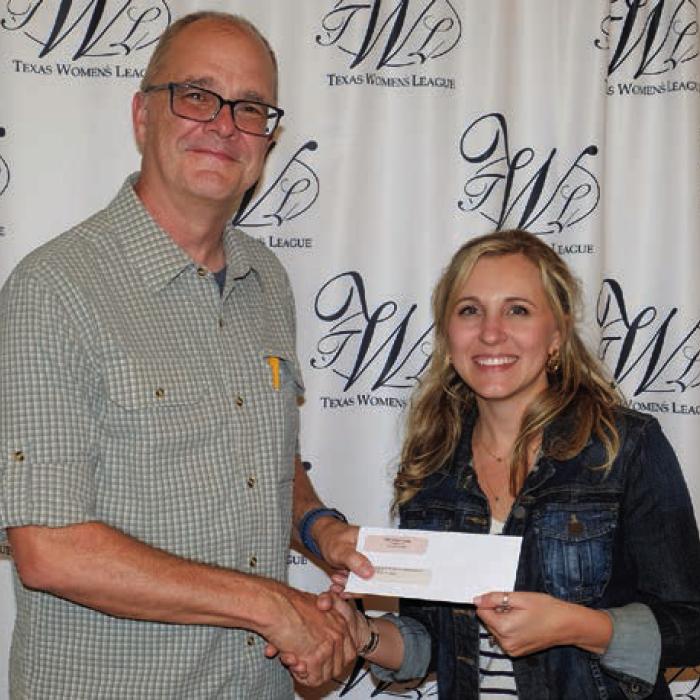 Texas Czech Heritage and Cultural Center received a $3,700 grant. Accepting the award was John Bartos (left) Presenter was Brittany Siptak (right).