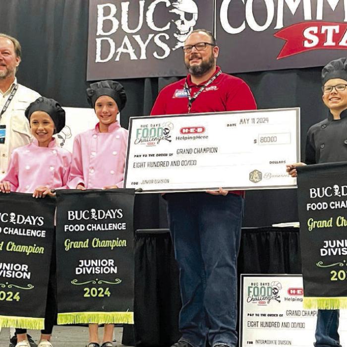 Champion Junior Team: Buc Days Representative, Emory Malota, Kloey Noska, HEB Representative, and Tate Fritsch.