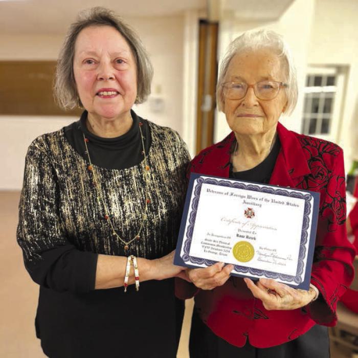 Rose Recek was presented a Certificate of Appreciation for her sixty-six years of continuous membership in the VFW Auxiliary 5254 by Auxiliary President Marilyn Kothmann.