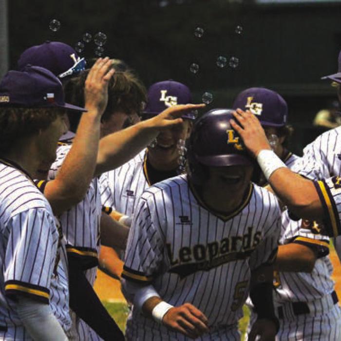 With every run the Leps scored Monday there was quite a celebration, including a tunnel and bubbles. Here Bennett Barber comes home with La Grange’s second run of the game.