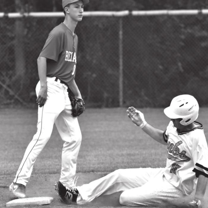 Round Top-Carmine’s Ryker Goehring slides safely into second base in Tuesday’s win.