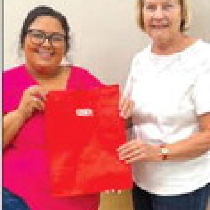 Pictured is Rosalinda Gonzalez, H-E-B Service Manager and Linda Oltmann, AMEN Board member.