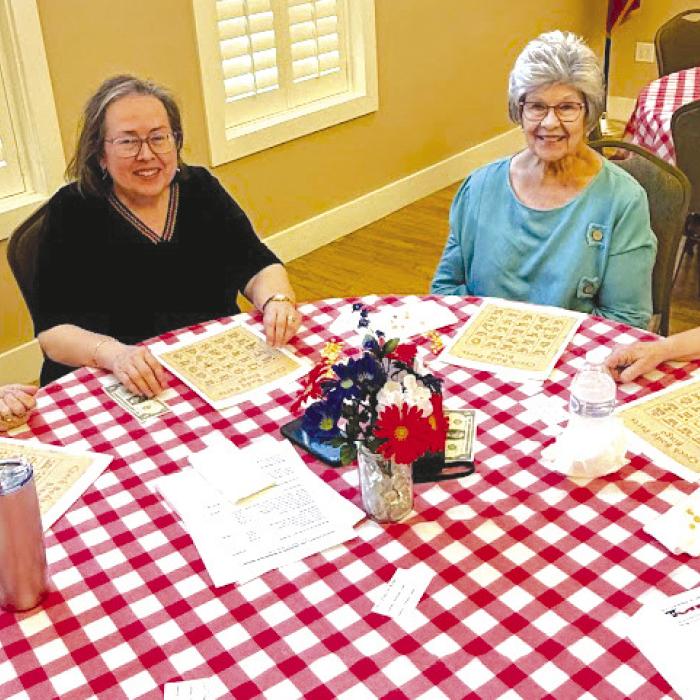 Chapter members enjoying a game of Czech-English bingo.