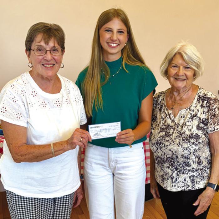 Pictured are Carolyn Heihnsohn and Chapter President Betty Danner presenting Clara Magliolo the CHS Scholarship check.