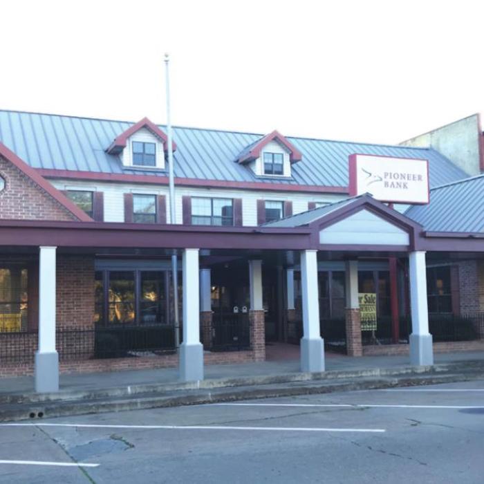 County Has Bank Building Under Contract for Expansion Plans