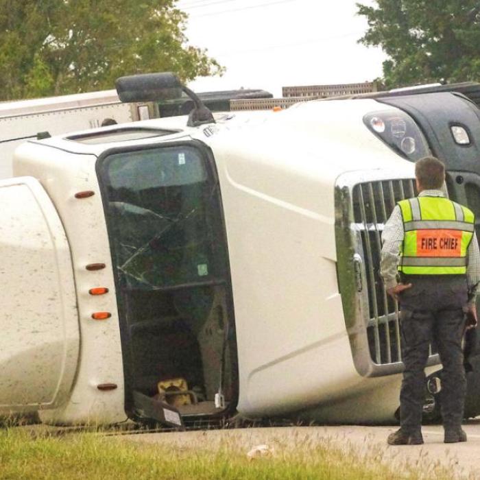 While Checking Cell Phone, Driver Flips Rig