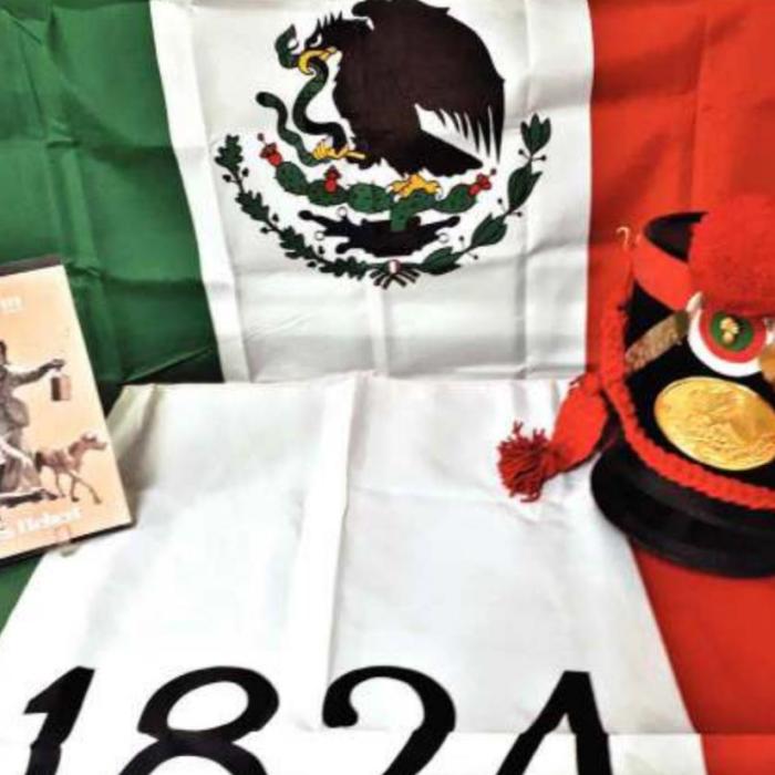 A display of the Mexican Flag and historical items relating to Texas from 1790 to 1836, the time period covered in Hebert’s book.
