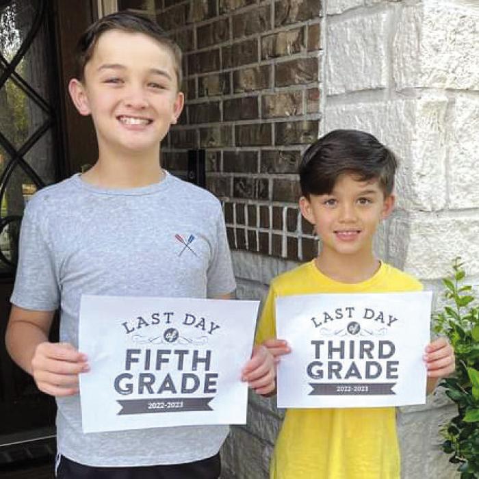 Kathy Chlumsky’s grandsons Conner and Hunter Dong on their last day of school when she went to see them.