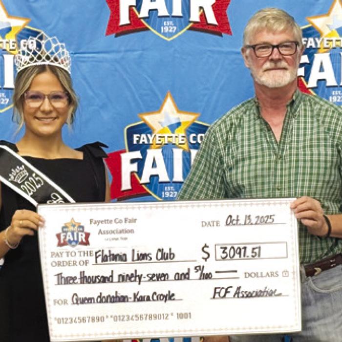 1st Runner Up Kara Croyle and Fayette County Fair Association President Michael Zuhn.