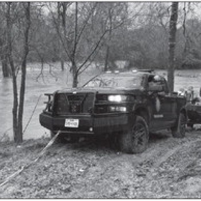 Man, 75, Rescued from Floodwaters