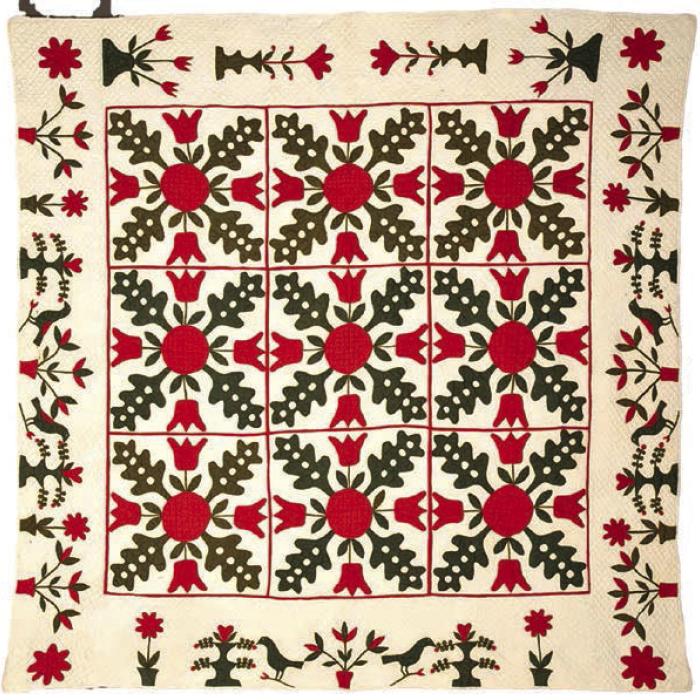 Oak Leaf and Tulip quilt, circa. 1850, maker unknown, part of the new exhibit, which opened last week at The Texas Quilt Museum.