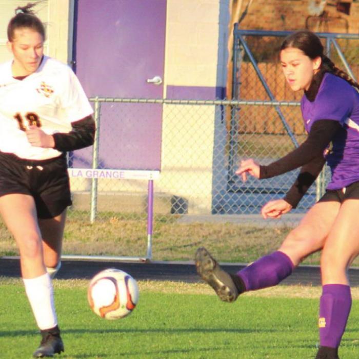 Jolie Gutierrez kicks the ball on the way to one of her three assists Friday. Photo by Jeff Wick