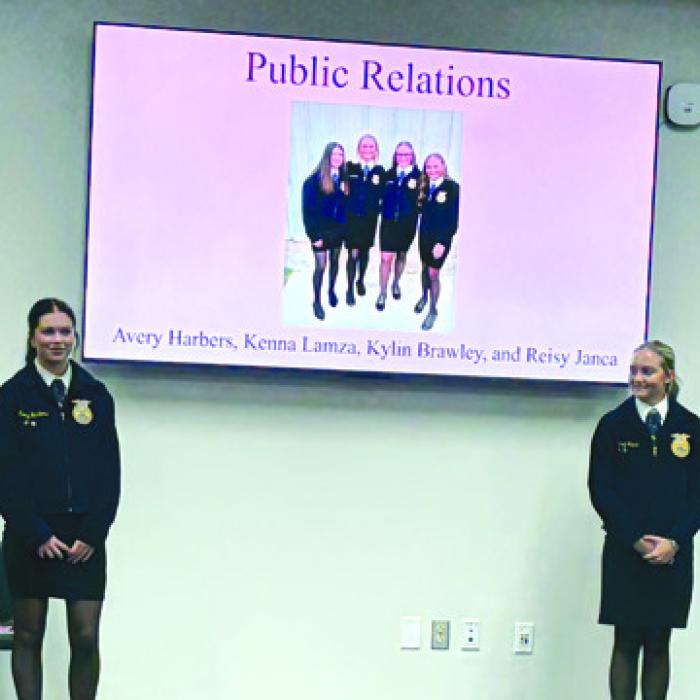 Avery Harbers, Kenna Lamza, Kylin Brawley, and Reisy Janca demonstrated their FFA competition presentation to the board at Monday night’s meeting.