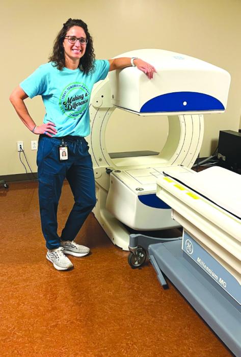 Ashley Havel, Director, Imaging Services is pictured with St. Mark’s new Nuclear Medicine Gamma Camera.