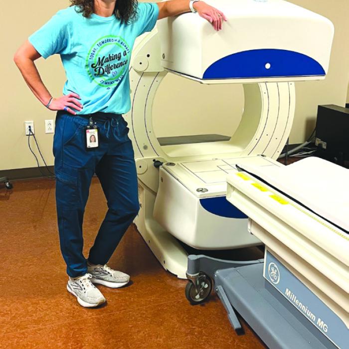 Ashley Havel, Director, Imaging Services is pictured with St. Mark’s new Nuclear Medicine Gamma Camera.