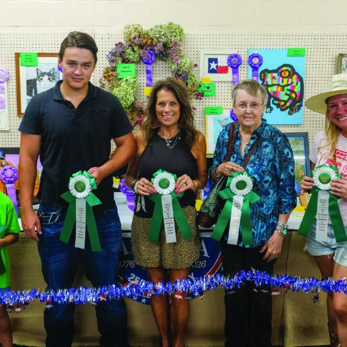 BEST OF THE CREATIVE ARTS DEPARTMENT From left, Jensen Sutherland won best of department in the child division for a ship; Austin Anderson won best of department in the teen division for a chair; Anissa Menefee won best of department in the adult division for a puzzle; Marcia Burchard won best of department in the semi-professional division for an orange purse; Kayli Head won best of department in the professional division for a wreath.