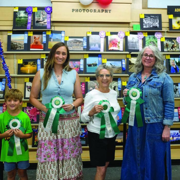 BEST OF PHOTOGRAPHY DEPARTMENT From left, Jensen Sutherland won best of department in the child division; Lorretta Greenwood won best of department in the adult division; Denise Winter won best of department in the senior division; Kim Anderson won best of department in the semi-professional division. Not pictured was Emma Koeth, who won best of department in the teen division.