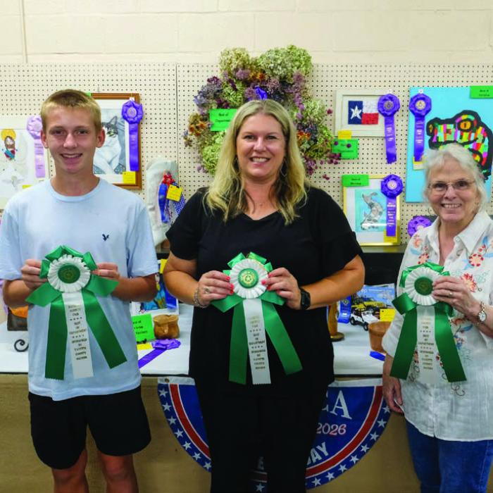 BEST OF THE FINE ARTS DEPARTMENT From left, Justin Jasek won best of department in the teen division for an entry titled “Beachy Ocean Frog,” Lyndsey Vasek won best of department in the adult division for an entry titled “Black and White Cat,” and Ina Feye Tilly won best of department in the senior division for an entry titled “Rooted and Grounded.” Not pictured was Sadie Naumann, who won best of department in the child division for an entry titled “Fish.”