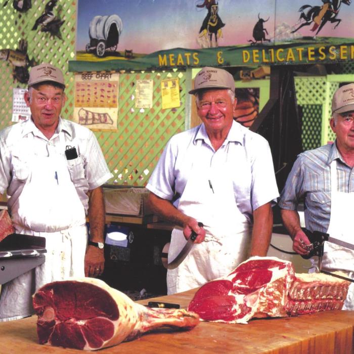Steve, Glen Jr. and Moxie Prause in the market. This picture was taken in 1995.