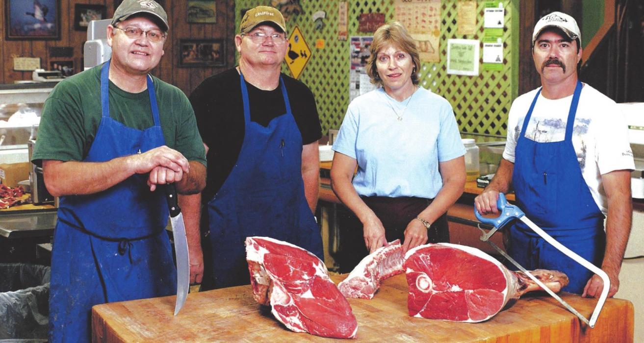 This photo was taken in 2007, the fourth generation Prauses working at the market: Gary, Brian, Kathy and Mark.