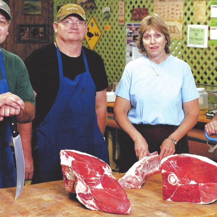This photo was taken in 2007, the fourth generation Prauses working at the market: Gary, Brian, Kathy and Mark.