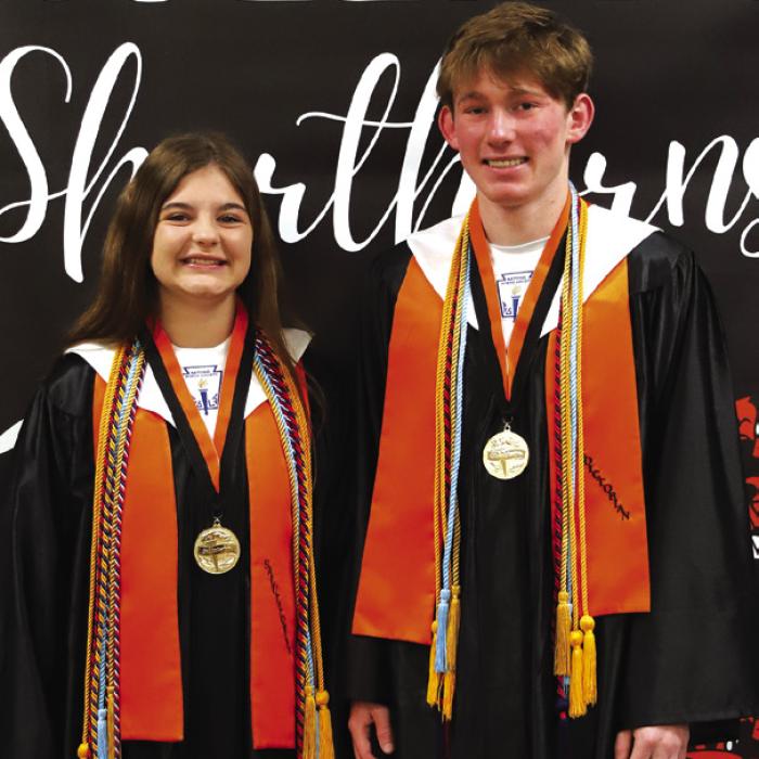 The top two Schulenburg graduates this year are Valedictorian Blake Helms, right, and Salutatorian Riley Zapalac, left. Photo by Audrey Kristynik