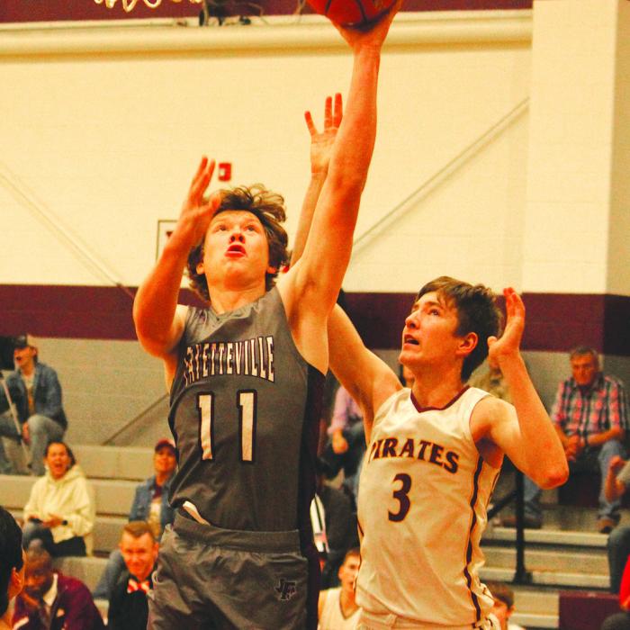 Fayetteville’s Jake Kubala drives for the basket for two points in Tuesday’s win. He scored 13. Photo by Jeff Wick