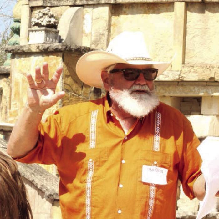 Richard Calloway, one of the event organizers, talks to the crowd Saturday.