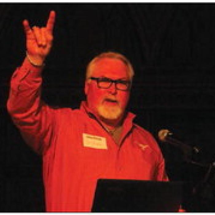 Brooks Kelly, a Fayetteville city councilman and former standout shot put track athlete at UT, was the keynote speaker Saturday. He talked about his rise from walk-on at the school to collegiate All-American.