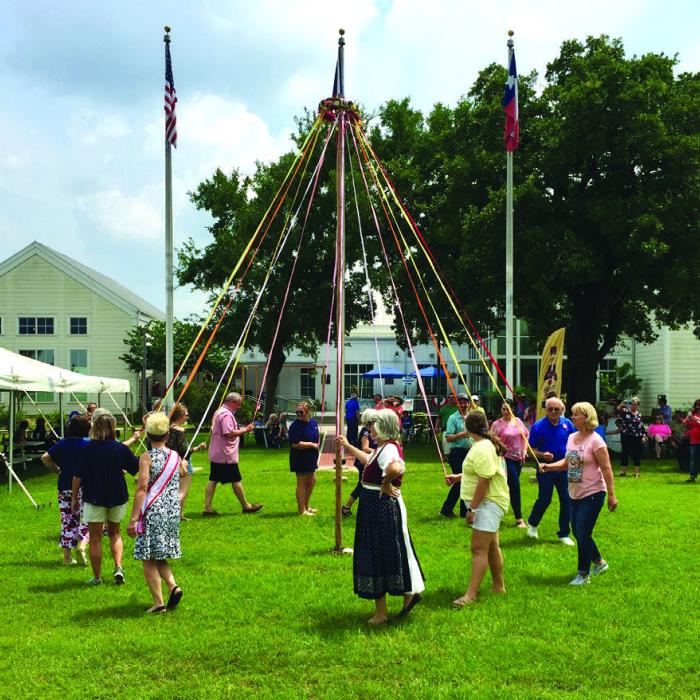 The day’s activities on May 18 include a traditional May Pole Dance at 2:30 p.m.