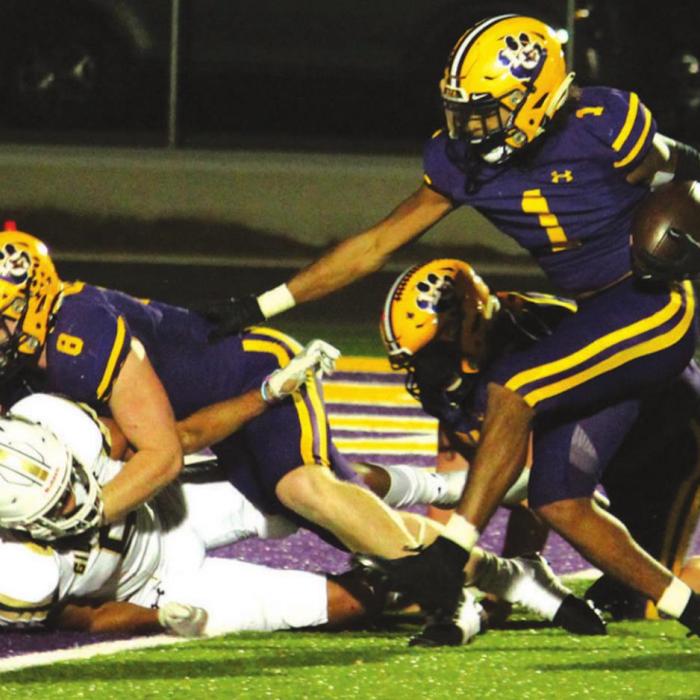 Behind a block from Ryder Imhoff, La Grange’s Bravion Rogers gets into the endzone Friday. Photo by Jeff Wick