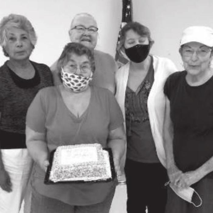 Celebrating September birthdays was: Madeline Schneider, Mary Ramirez, Betty Gabler, Misty Schindler, Sandy Colvin, Judy Klesel. Holding the cake is Carolyn Moore.