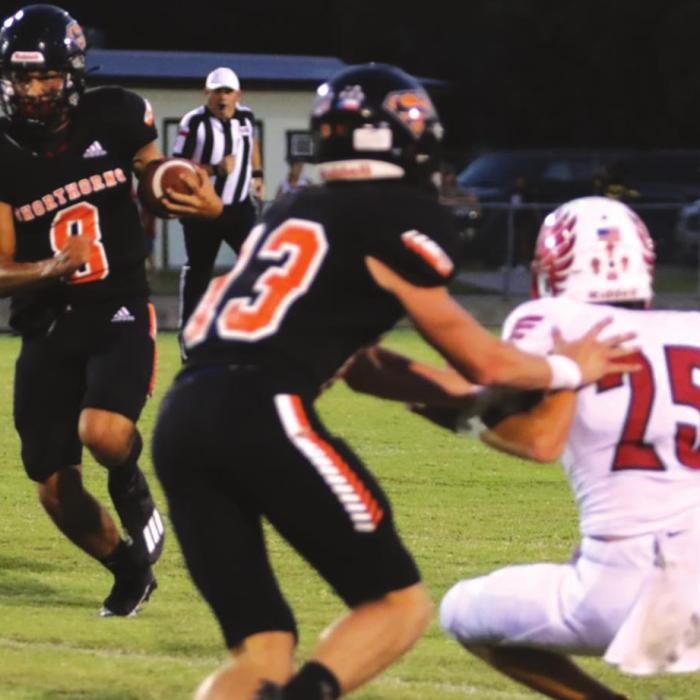 Schulenburg quarterback Tyler Ryba runs the football Friday. Photo by Audrey Kristynik