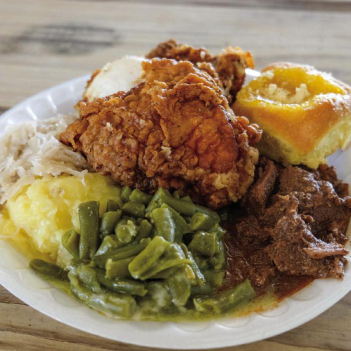 A delicious meal from the Praha Picnic – Praha’s famous fried chicken and stew, creamy green beans, German potatoes, sauerkraut and a lemon kolache.