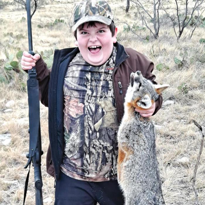Rilan Karisch with the fox he hunted in Eldorado.