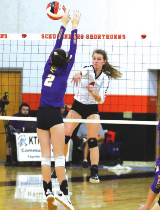 Schulenburg’s Jordan Sommer spikes the ball past a Weimar player in Tuesday’s match. Photo by Audrey Kristynik
