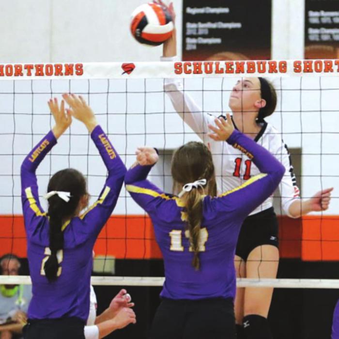 Meredith Magliolo spikes a ball in Tuesday’s Lady Horns victory. Photo by Audrey Kristynik