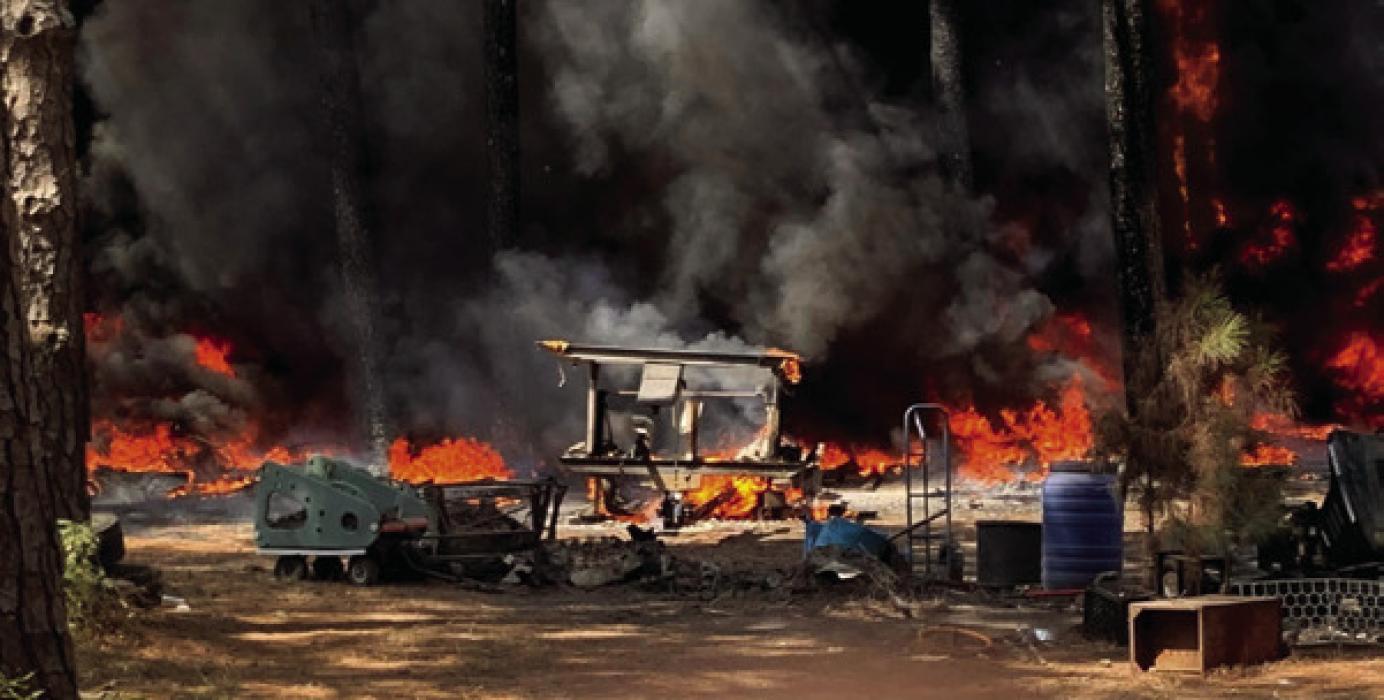 An old travel trailer was destroyed in the fire north of La Grange Thursday. Photo by The Fayette County Sheriff’s Office