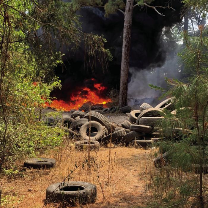 A large number of tires were among the debris that burned in the fire Thursday. Photo by Pct. 1 Commissioner Jason McBroom