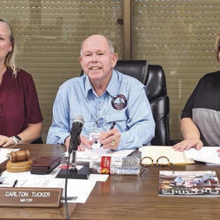 Pictured from left: Kristi McBride, PAT Executive Director; Weimar Mayor Pro Tem Carlton Tucker; and Karen Hoskins, PAT Program Director.