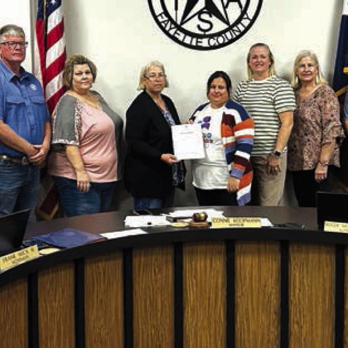 Pictured from left: Tami Walker (City Administrator), Greg Thomas (Alderman), Frank Wick III (Alderman), Karen Hoskins (PATRSCTX Program Director), Connie Koopmann (Mayor), Tara Stech (PATRSCTX Parent Educator), Kristi McBride (PATRSCTX Executive Director), Kathy Kleiber (Alderman), Roger Moellenberndt (Alderman), Clarence Ahlschlager (Alderman).